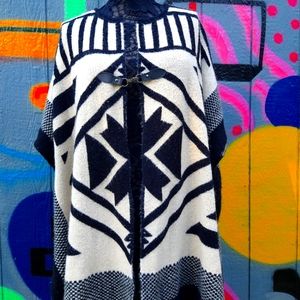 BCBGMaxAzria cream and black cape